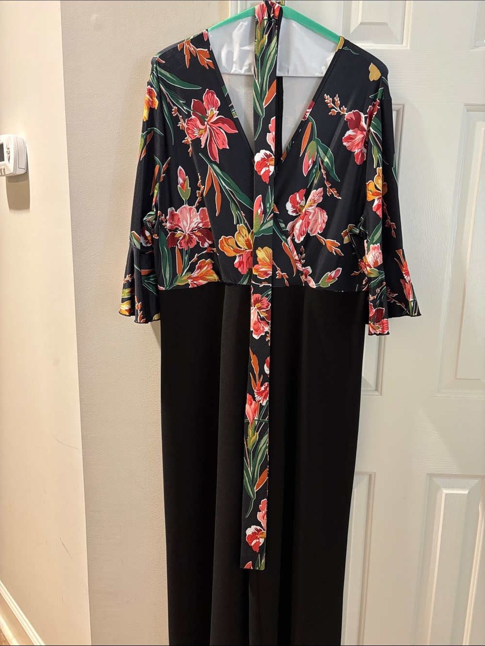 Black Floral Wrap-Style Jumpsuit with Pink & Yellow Blooms